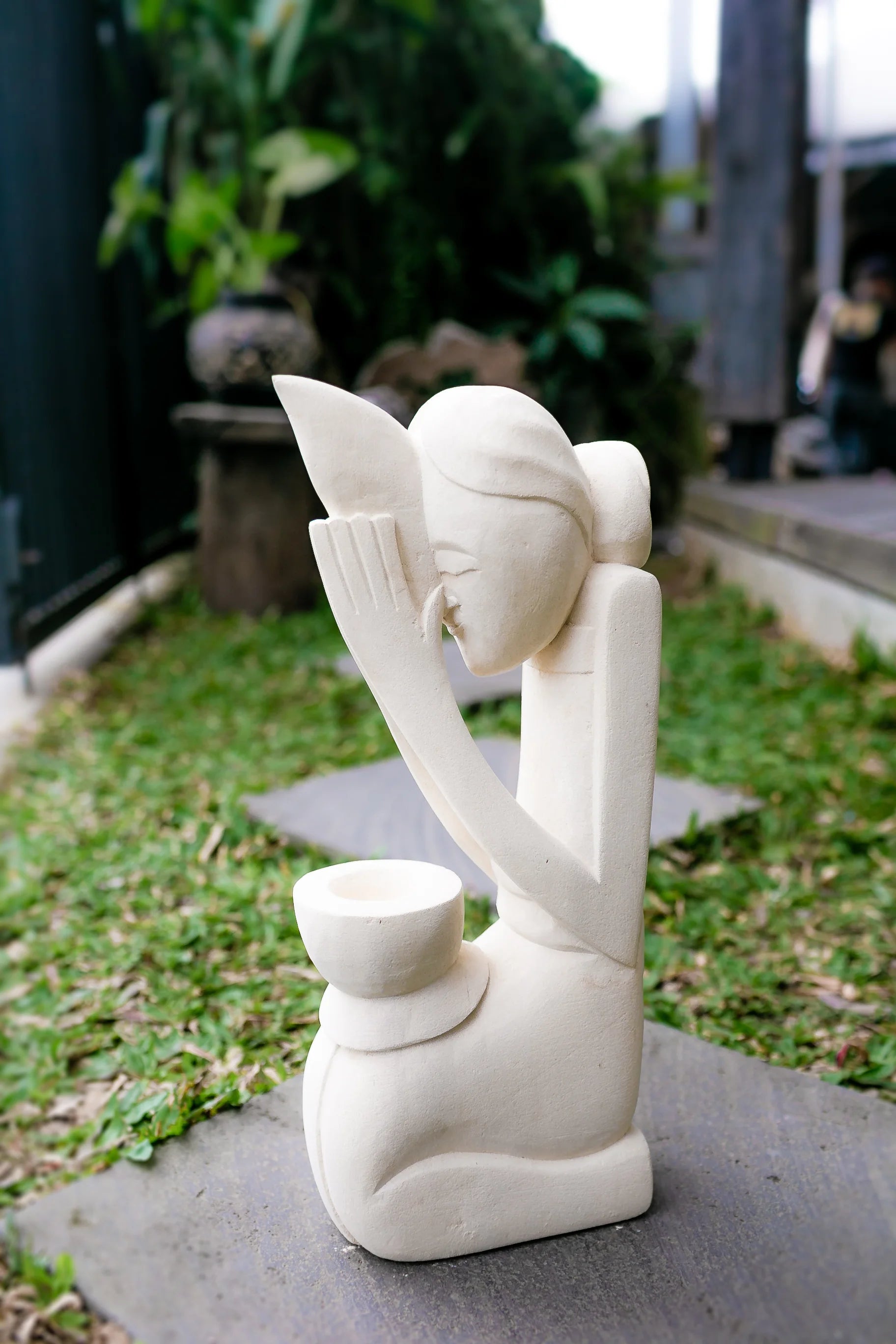 Selamat Datang Welcoming Lady, Outdoor Decor: Front view displaying the statue's serene grace in limestone white, ideal for enhancing the positivity of entryways or gardens. Click for detail.