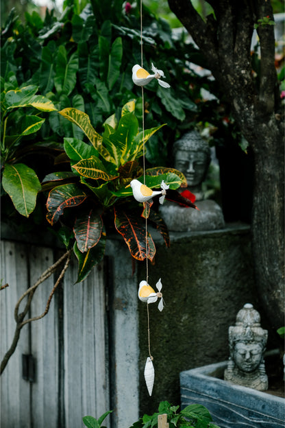 Humming birds in flight Yellow