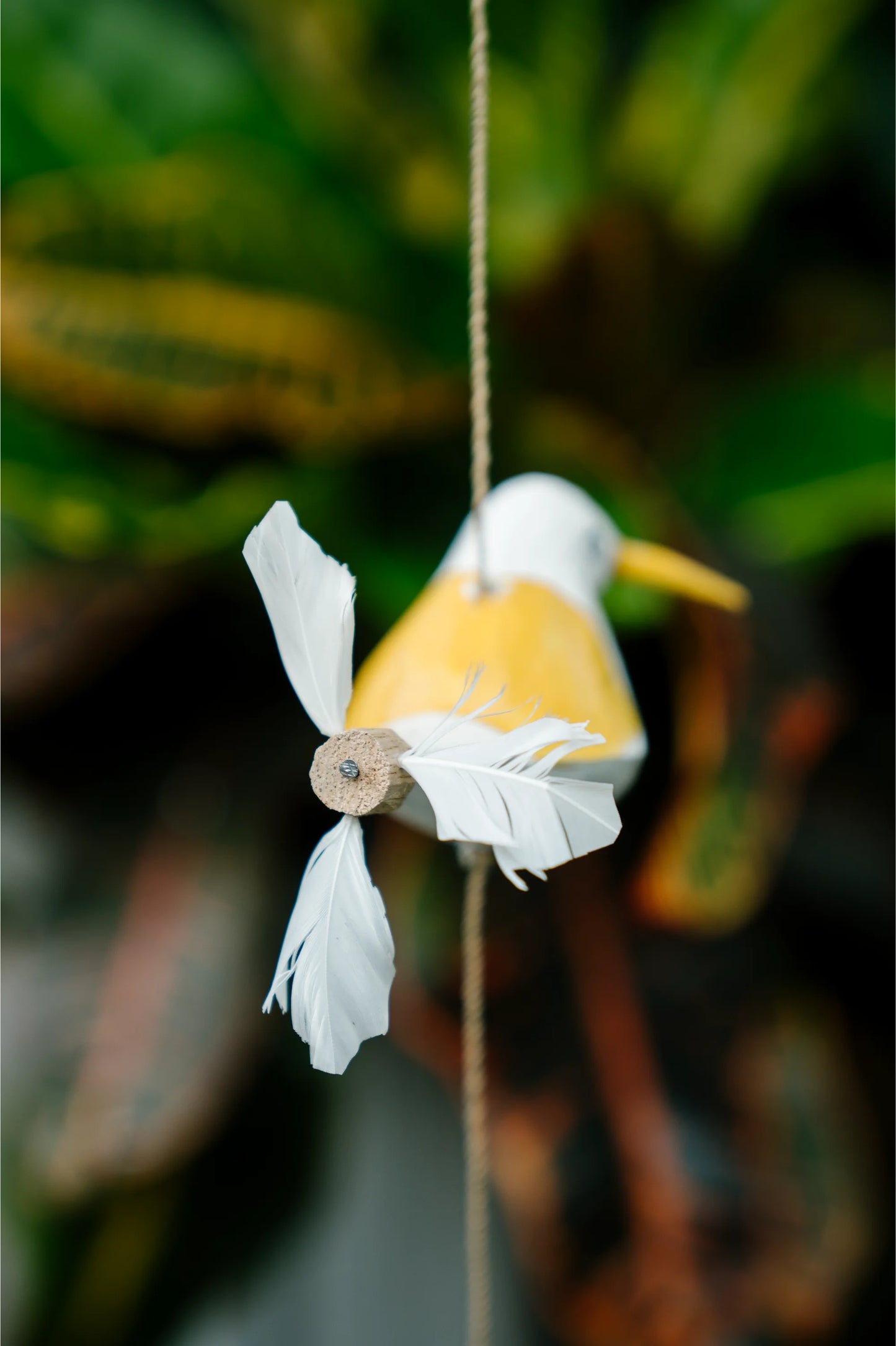 Humming birds in flight Yellow
