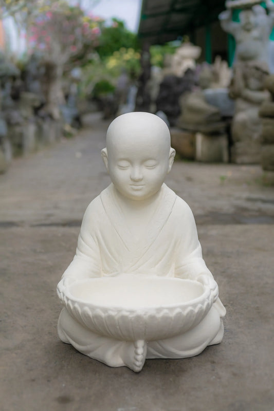 Young Monk with receiving Bowl